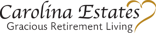 Logo for Carolina Estates Gracious Retirement Living. The text is in elegant, cursive font with a golden heart shape integrated into the design.