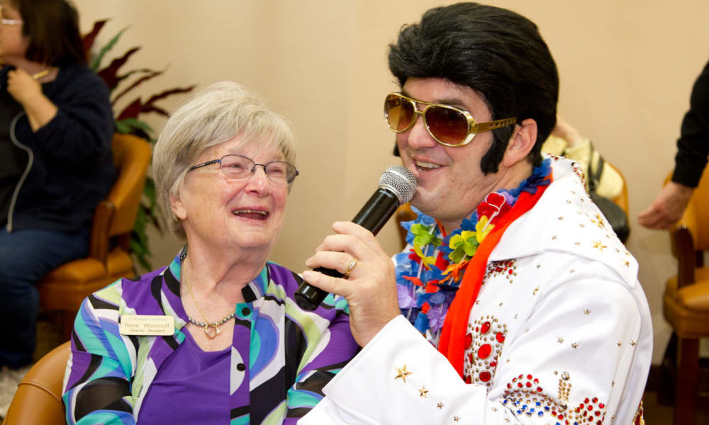 Hawthorn Senior Living. Chesterfield Heights Senior Resident is Singing With Elvis Impersonator.