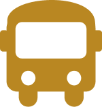 Icon of a front-facing school bus in a brownish-gold color. The design is simplified with a large windshield and round headlights.