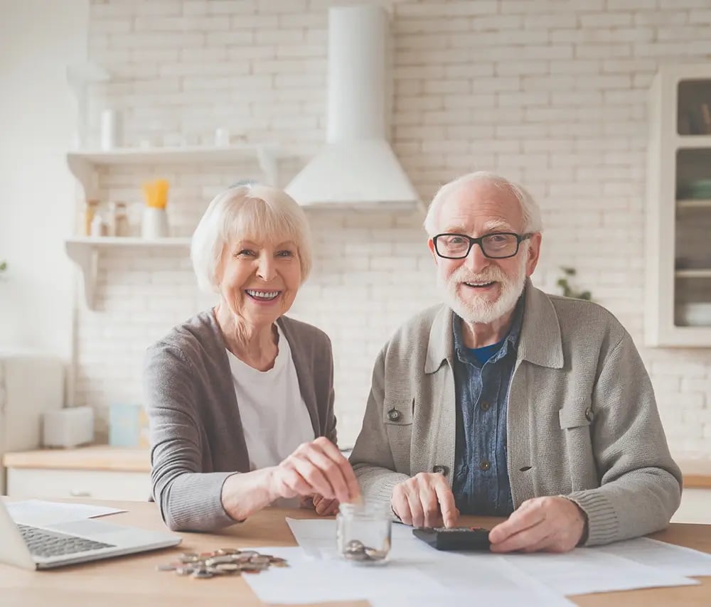 Senior Couple Sitting at Table