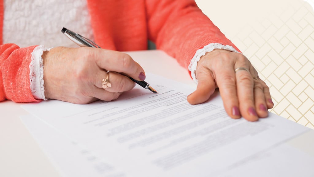 Woman filling out paperwork