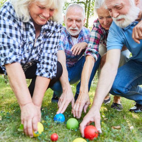 Seniors playing Bocce Ball
