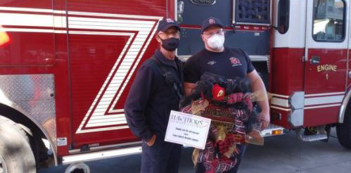Fireman in front of fire truck