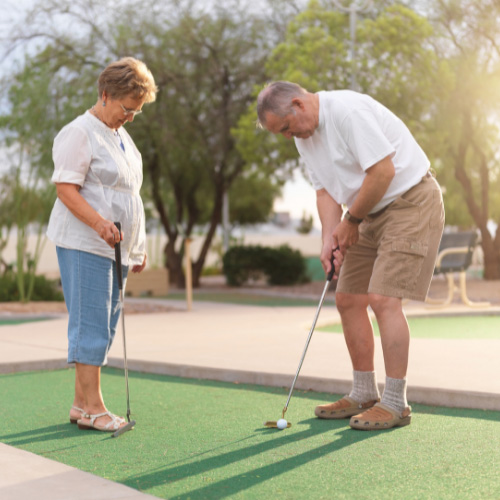 Seniors playing Miniature golf
