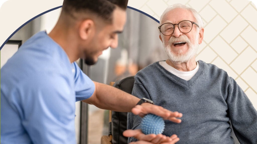 Nurse helping senior with hand therapy