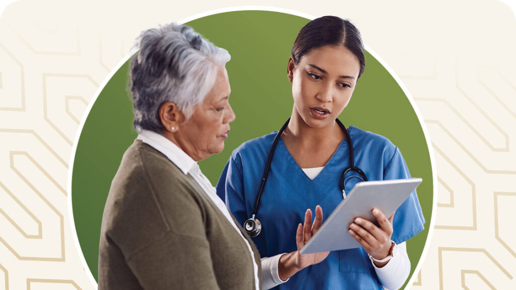 Nurse helping a resident on a ipad