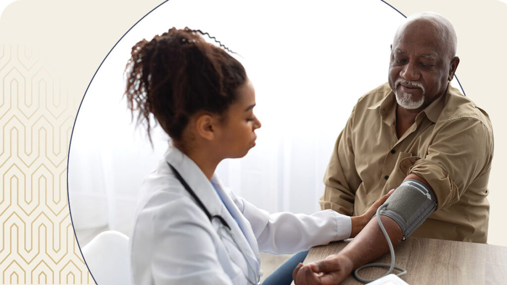 Nurse taking seniors blood pressure