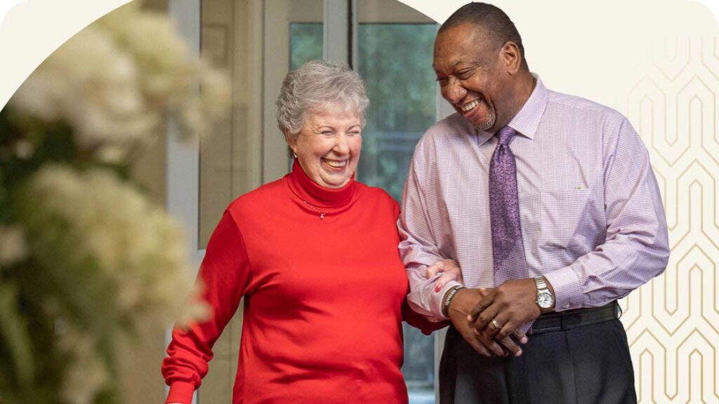 Senior couple walking and smiling