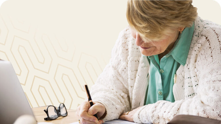 Senior woman filling out paperwork