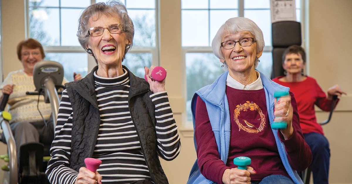 Seniors exercising in a classroom