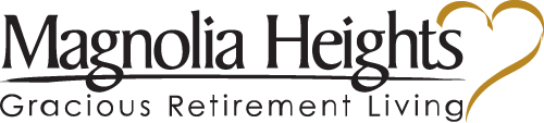 The logo for Magnolia Heights features the text "Magnolia Heights" in large, elegant font, with "Gracious Retirement Living" underneath. A golden heart outline accents the right side of the text.