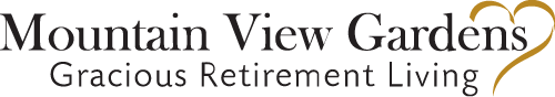 Mountain View Gardens logo with the tagline 'Gracious Retirement Living' underneath. The words are in dark lettering, with a yellow heart graphic incorporated into the design.