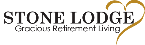 The logo features the text "STONE LODGE" in large, capital letters, with "Gracious Retirement Living" in smaller letters below. To the right of the text is a gold, heart-shaped design.