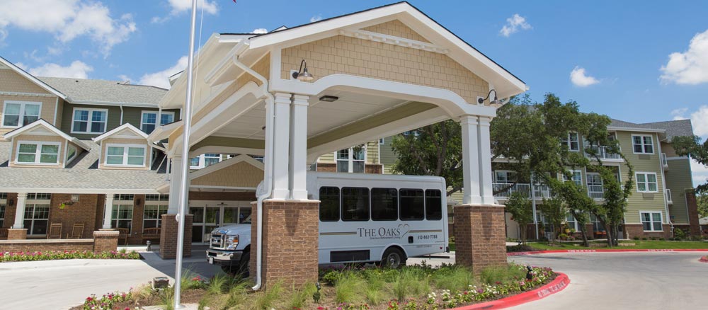 A white shuttle bus labeled 