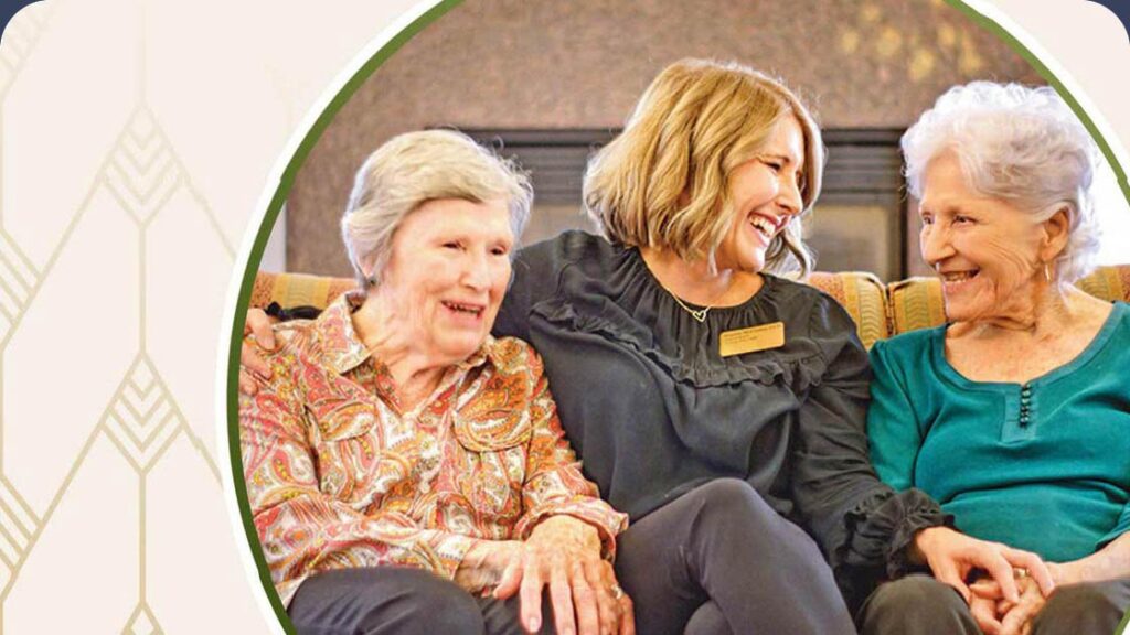Female employee sitting on the couch and laughing with senior women