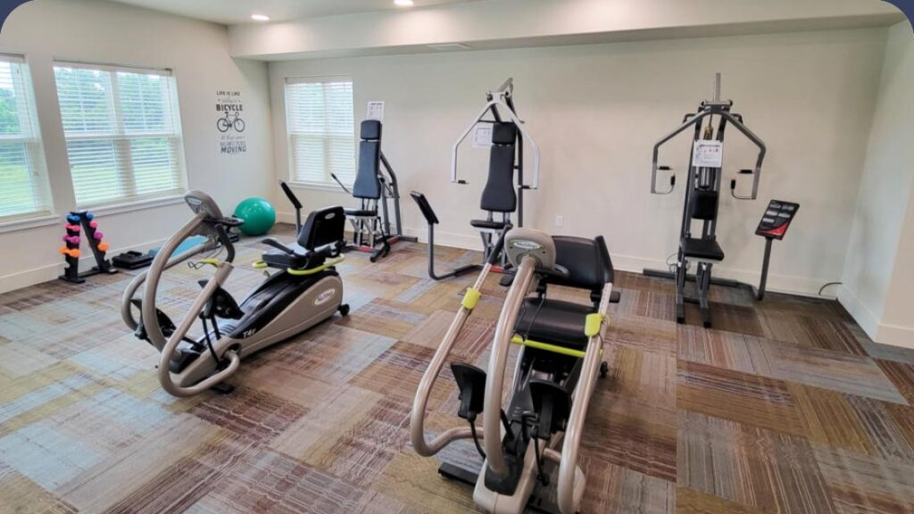 Gym room with exercise bikes and other equipment