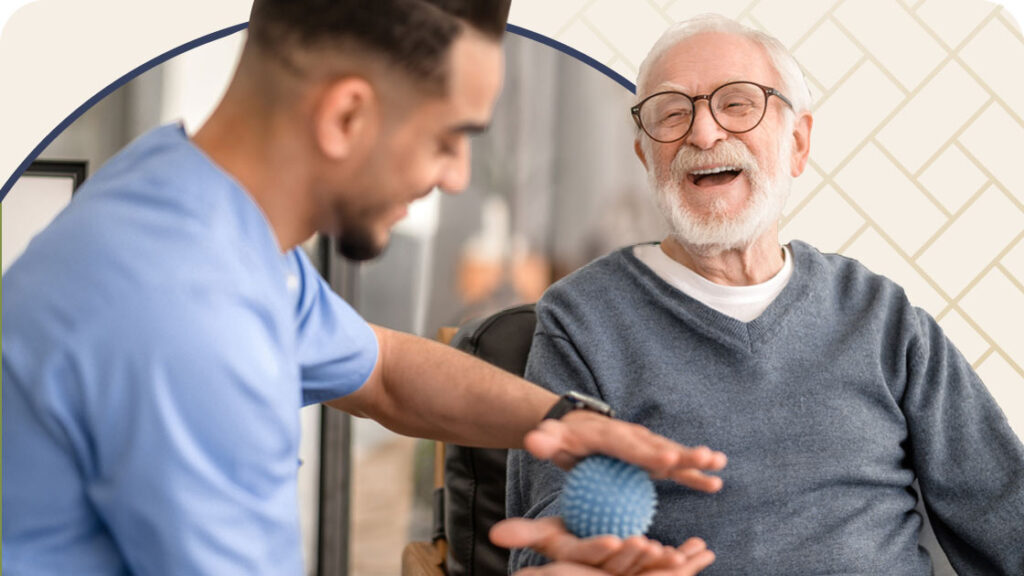 Nurse helping senior man with hand therapy exercise using a small ball