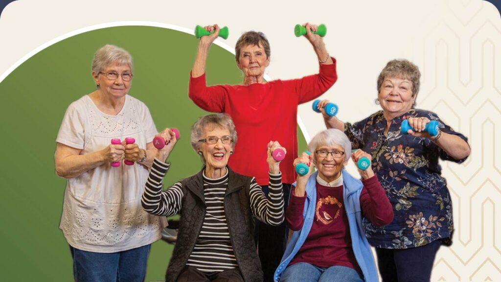 Group of senior women smiling while posing with dumbbells