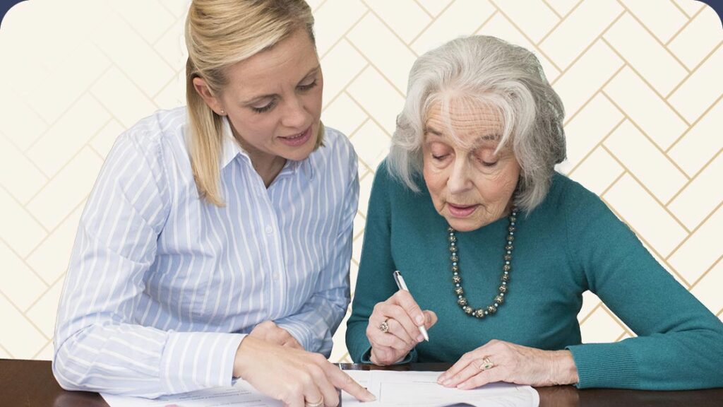 Older woman helping senior woman fill out paperwork